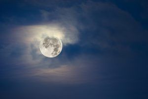 Full moon and cloudy sky